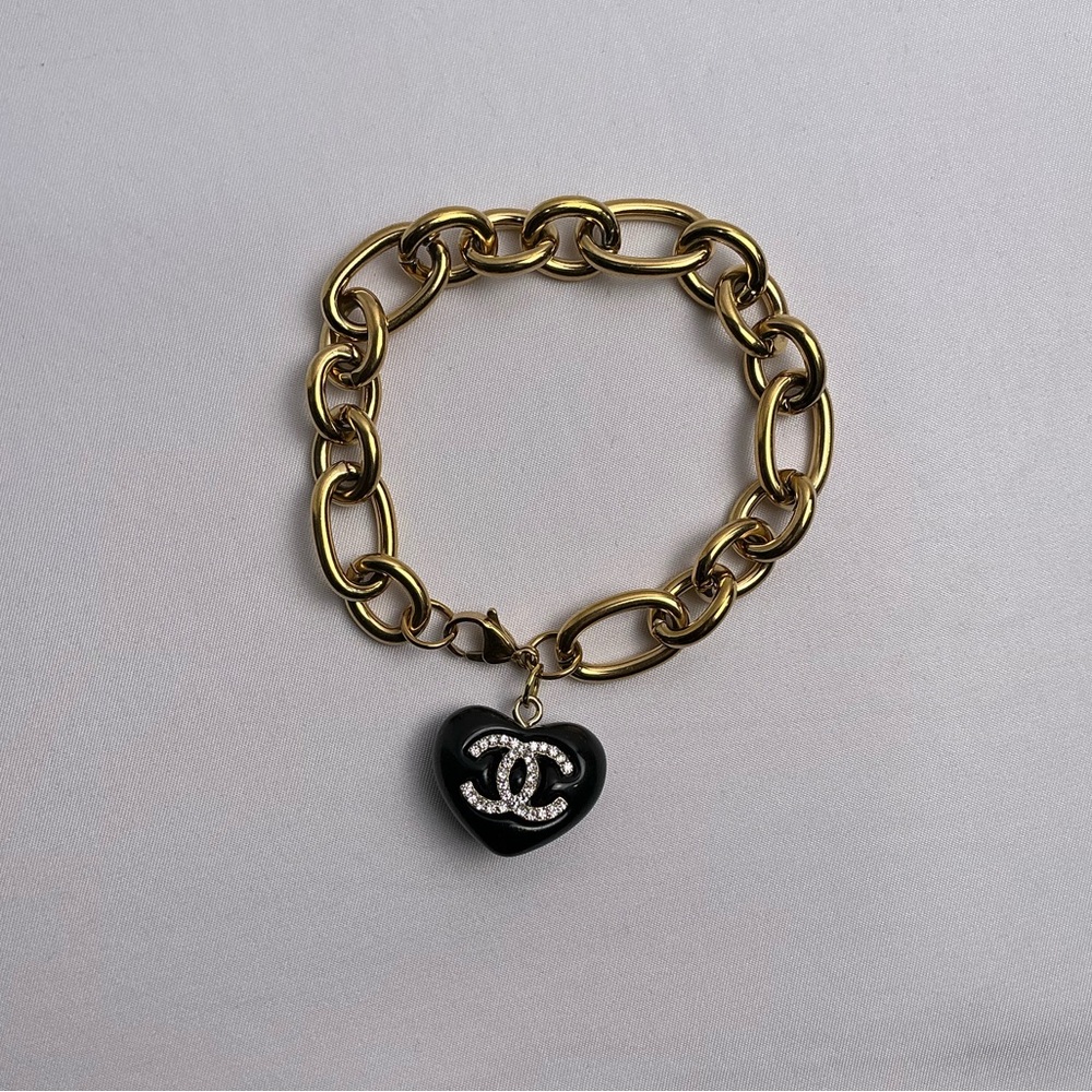 CHANEL Gold Bracelet with Black Fat Heart Pendant